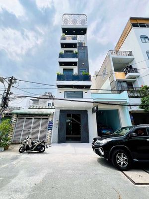 Nhà phố Thang máy 4x16m gần THCS Nguyễn An Ninh, đường 8m thông — ảnh 1