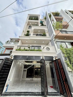 Siêu Phẩm đẹp mê 5,5m x 16m. 4 Tầng Thang Máy Hẻm 8M thông Hà Huy Giáp — ảnh 1
