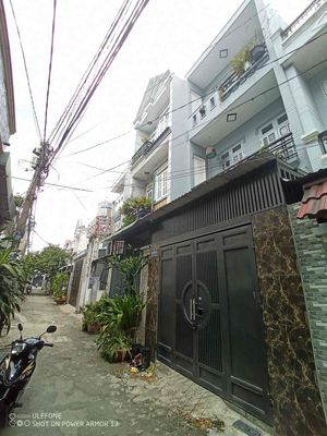 Chi thuê nhà mới xây mặt tiền HT q12 210m 3tầng 4PN 3wc kd vp vip10tr