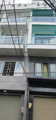 Nhà 1 Trệt 3 Lầu Sân Thượng 4PN Hẻm Xe Xe Bùi Văn Ba Quận 7 — ảnh 1