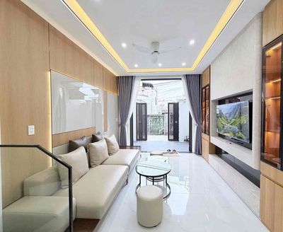 Nhà 2 tầng - Hẻm xe hơi - Phạm Văn Đồng — ảnh 1