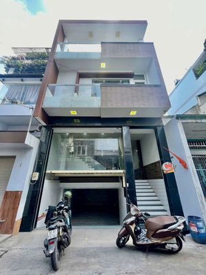 Nhà đẹp có hầm 6x12m 4 tấm hẻm xe hơi đường đất mới