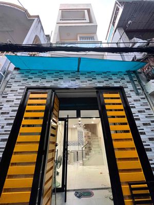 Nhà 4 tầng đẹp, sát mặt tiền Đoàn Văn Bơ, hẻm thông