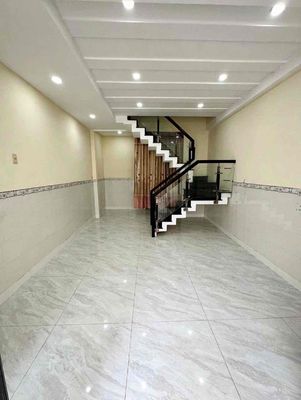 Nhà mới sửa : trệt lầu 2pn 3wc (4 12m) - gần đường mới bờ kênh