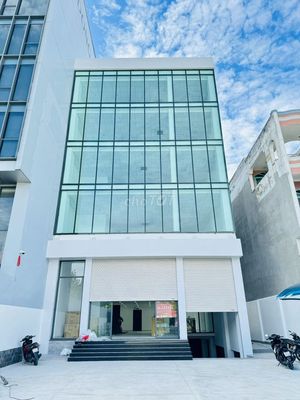 Toà nhà cho thuê 10x16 hầm 6 tầng mặt tiền phan đăng lưu pn mới đẹp