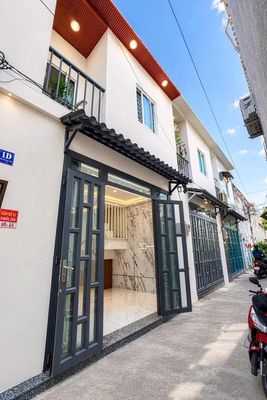 Bán nhà mới xây ngay bến xe buýt Thới An, Lê Văn Khương, giá 1tỷ030 tr