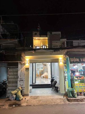 * Nhà nguyên căn mặt tiền 153 Thống Nhất, P11 — ảnh 1