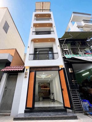 Bán nhà mặt tiền Cô Giang Phú Nhuận 42m2 5 tầng 7PN nở hậu — ảnh 1