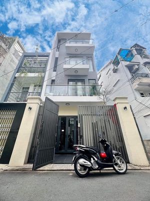 Nhà mtkd đường nhất chi mai, dt 4x20m, trệt 2 lầu, st có sẵn máy lạnh — ảnh 1