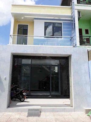 Nhà 1 trệt 1 lầu - 5,5 x 14,5m - mặt tiền đường thông — ảnh 1