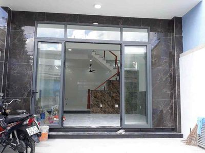 Nhà mặt tiền 2 lầu 5.5x14.5 đường 58 Phước Long A — ảnh 1