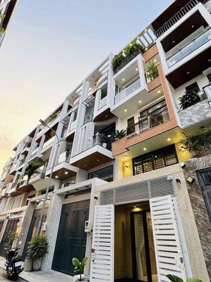 Nhà phố khu đồng bộ, có gara xe hơi, bếp lửng, pn rộng — ảnh 1