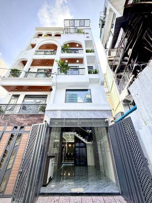 Nhà Phố 4 tầng Thang Máy Hẻm nhựa 8M Đ. Huỳnh Thị Hai Khu đồng bộ — ảnh 1