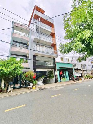 Bán tòa nhà văn phòng mặt tiền Lê Niệm 6x19m Hầm + 7 tầng có thang máy — ảnh 1