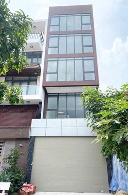 Toà Nhà Vườn Lài 5x20 hầm trệt 4 lầu thang máy trống suốt cho thuê — ảnh 1
