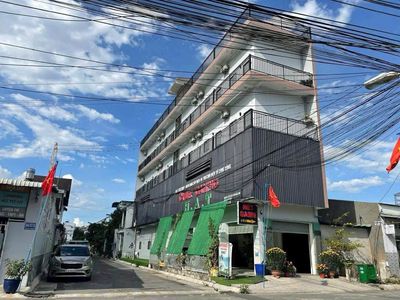 Bán nhà góc 2 mặt tiền 4 lầu, 12.9 tỷ, Đại học Thủ Dầu Một — ảnh 1