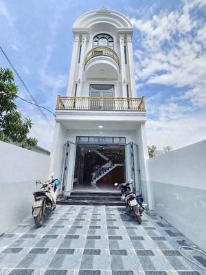 Nhà mặt tiền 1 trệt 2 lầu gần Chợ Dĩ An, Bình Dương — ảnh 1